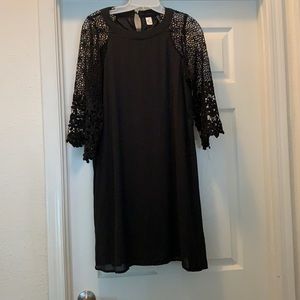 3/4 sleeve black dress. Never worn brand new